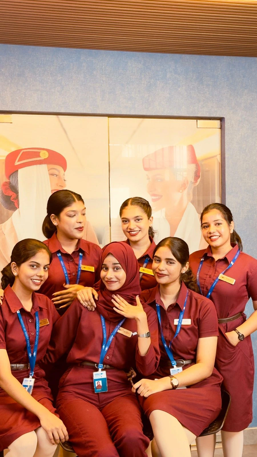 Students in aviation training uniforms posing together during cabin crew and aviation course at Neerja Aviation Institute